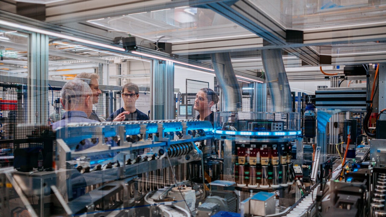 Siemens and Microsoft employees work together to scale industrial AI.