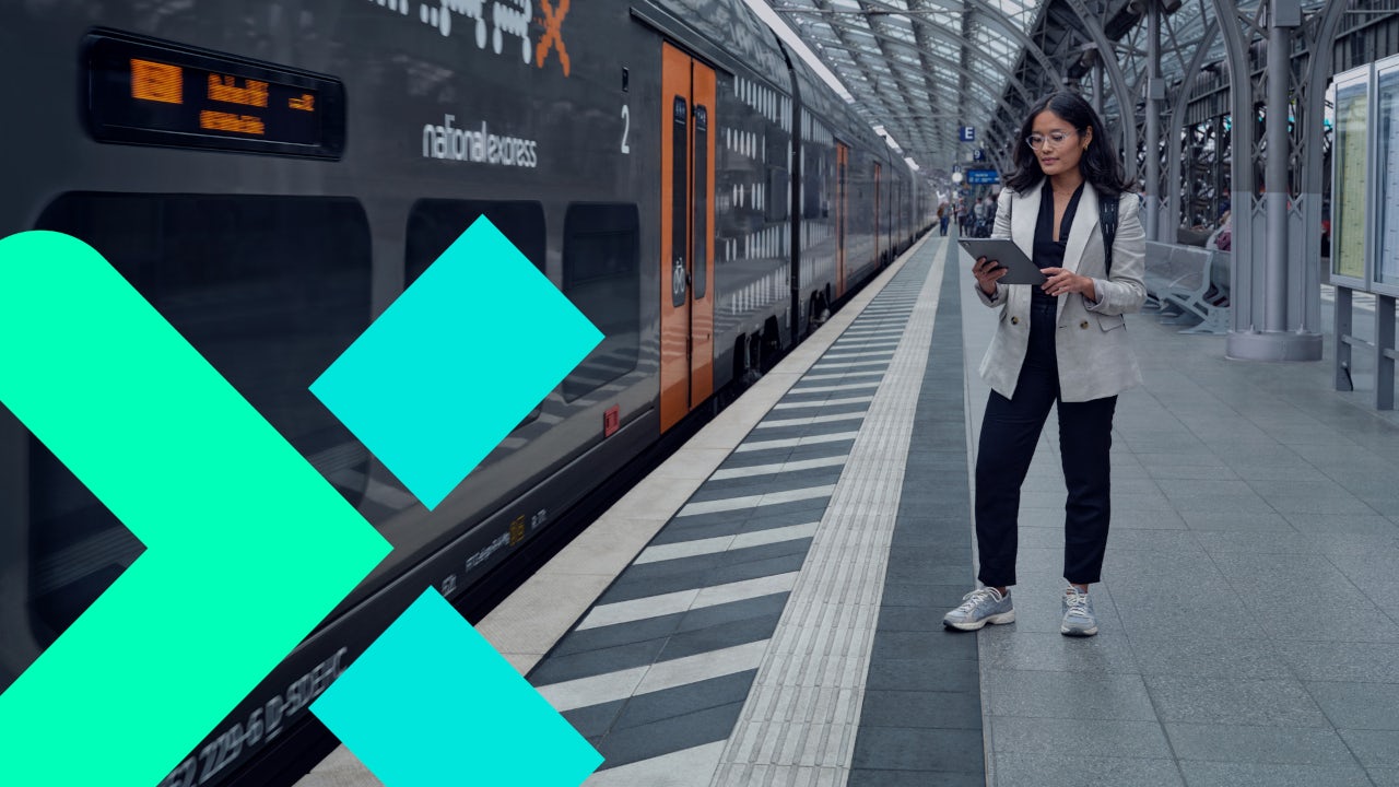 A Siemens Mobility cybersecurity image featuring a person in a blue shirt and a blue and white background.