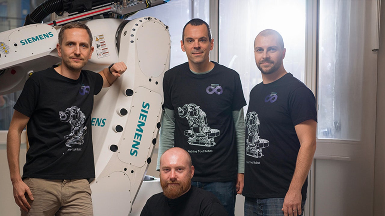 A team of robots with hybrid drives working on a project in a factory.