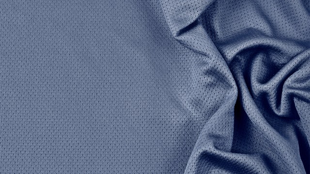 Closeup of blue grey textile.