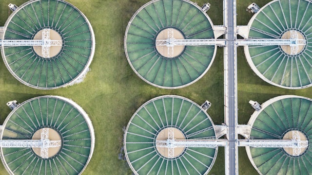 The image shows a control panel with various buttons and displays, likely used for industrial automation and process control.