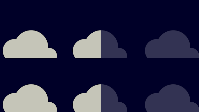 A person is standing in front of a large screen displaying a graph with a line going up, representing carbon emissions.